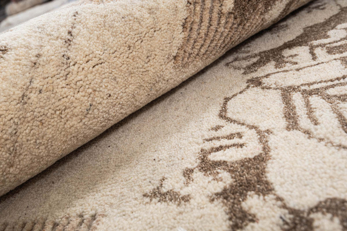 Ivory distressed traditional handmade wool and silk rug